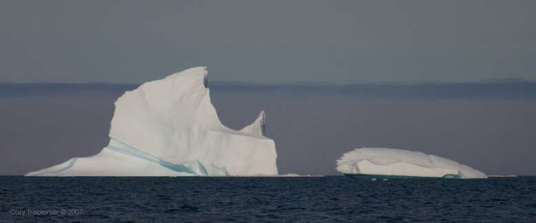 The stretch of coastline north of Clyde River is completely exposed to the Davis Straight. This afforded a chance to see dozens and dozen of icebergs such as this one, coming down from Greenland and from further up the Canadian Coast. Greenland, though not visible to the eye, is somewhere way past the horizon in the photo.