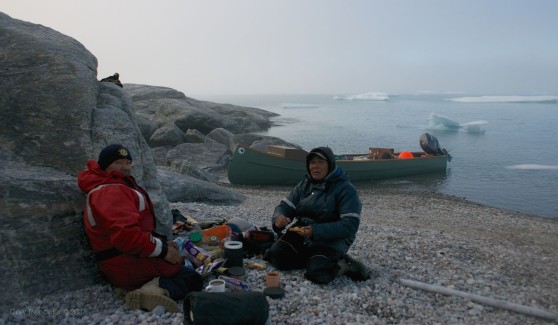 Officially a little ways into Sam Ford Fiord, Sam and Jayko pull over to this quiet beach for a coffee break. They never leave for a boat trip without a thermos of hot water. Good planning, especially in this weather!