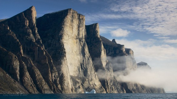 Fantastical mountains of granite rising from the depths of the ocean. That pretty well describes Sam Ford Fiord. For scale, notice the size of the large iceberg in the water.