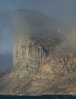 Sheer... vertical... rock.