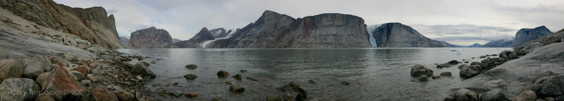 Walker Arm. We entered the fiord from the left side and camped across from the massive cut in the wall to the right.