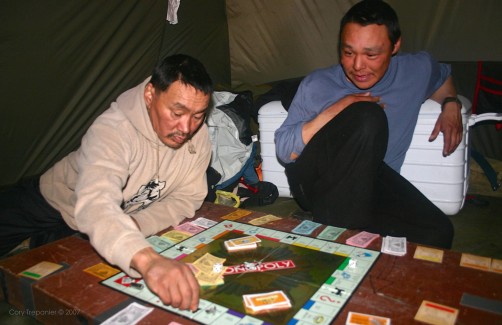 With the rain having settled in for the night, Jayko pulls out the Monopoly he had hiding in his pack.
